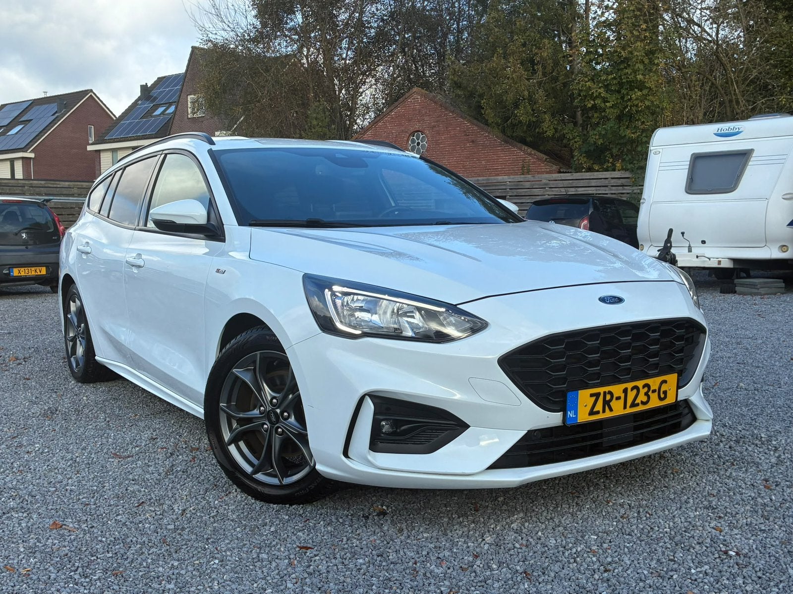 Ford Focus 1.0 ST-LINE AUTOMAAT/ WINTERPACK / CAMERA / TRKHK, Auto's, 125 pk, 715 kg, Wit, 1331 kg