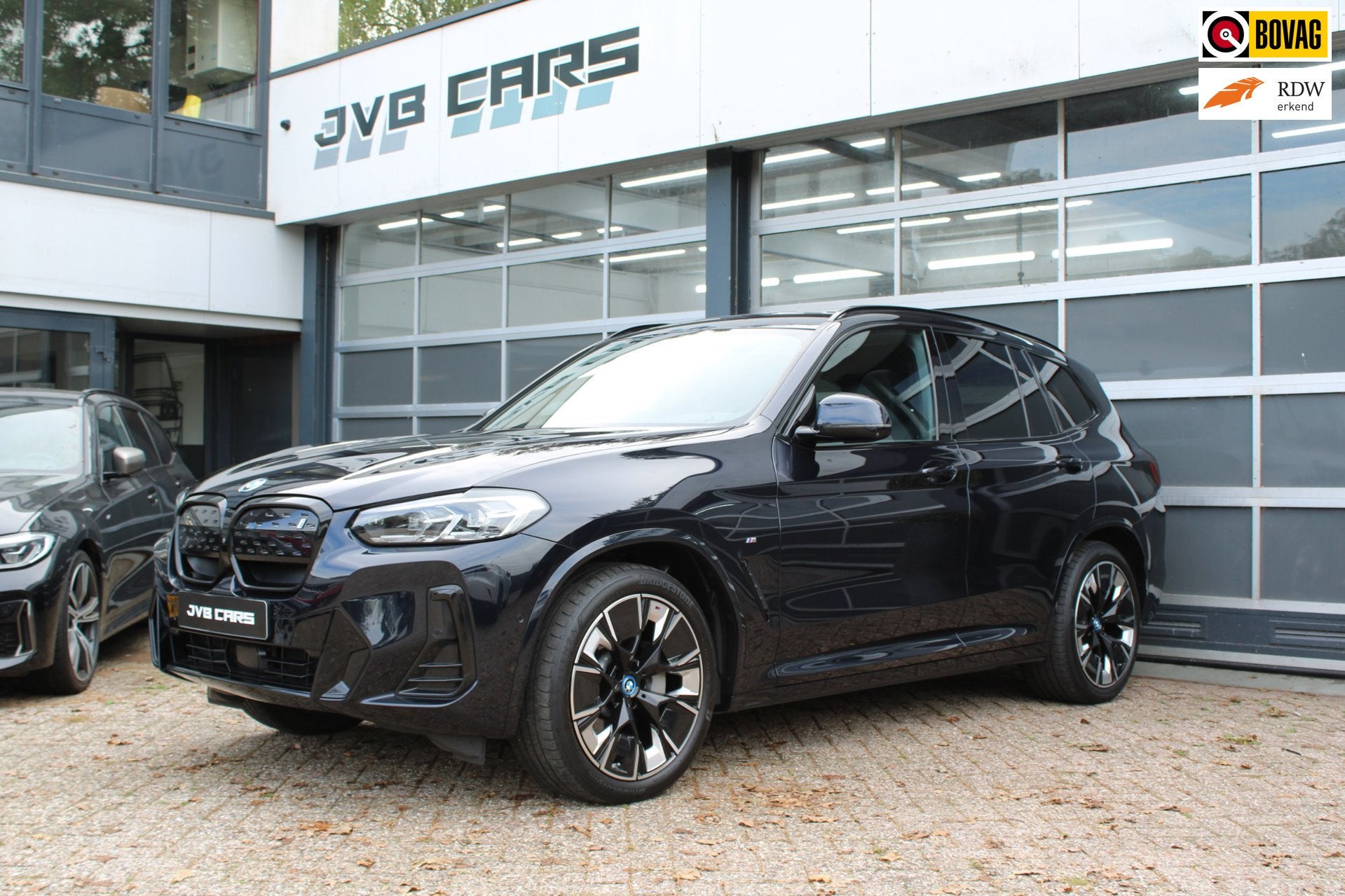 BMW IX3 High Executive 80 kWh/pano/Mpakket, Auto's, Automaat, Gebruikt, Zwart, Zwart