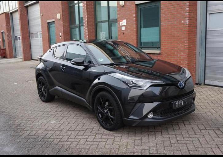 Toyota C-HR 1.8 Hybrid FULL Opt | leder | trekhaak | camera, Auto's, Toyota, 725 kg, Zwart, 4 cilinders, Lichtsensor