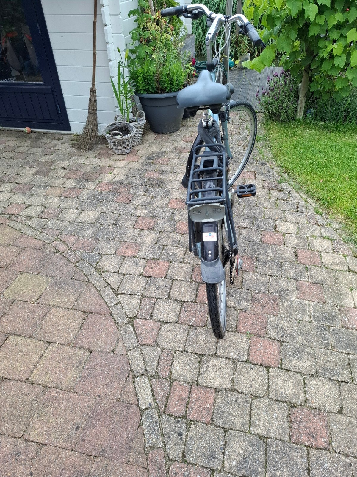 Giant fiets met versnellingen en bagagedrager, Ophalen