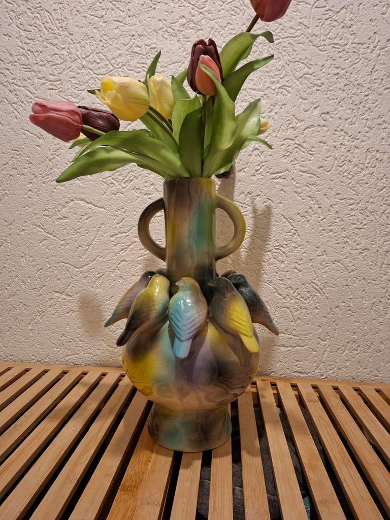 Unieke vaas met vogeltjes en neptulpen, Ophalen