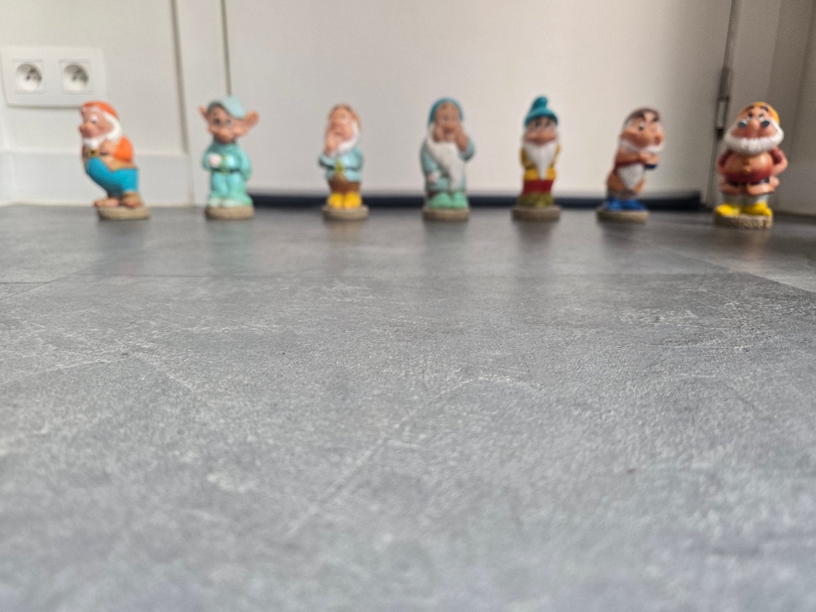 Collectie van 7 de Zeven Dwergen kunststof beeldjes, Ophalen of Verzenden