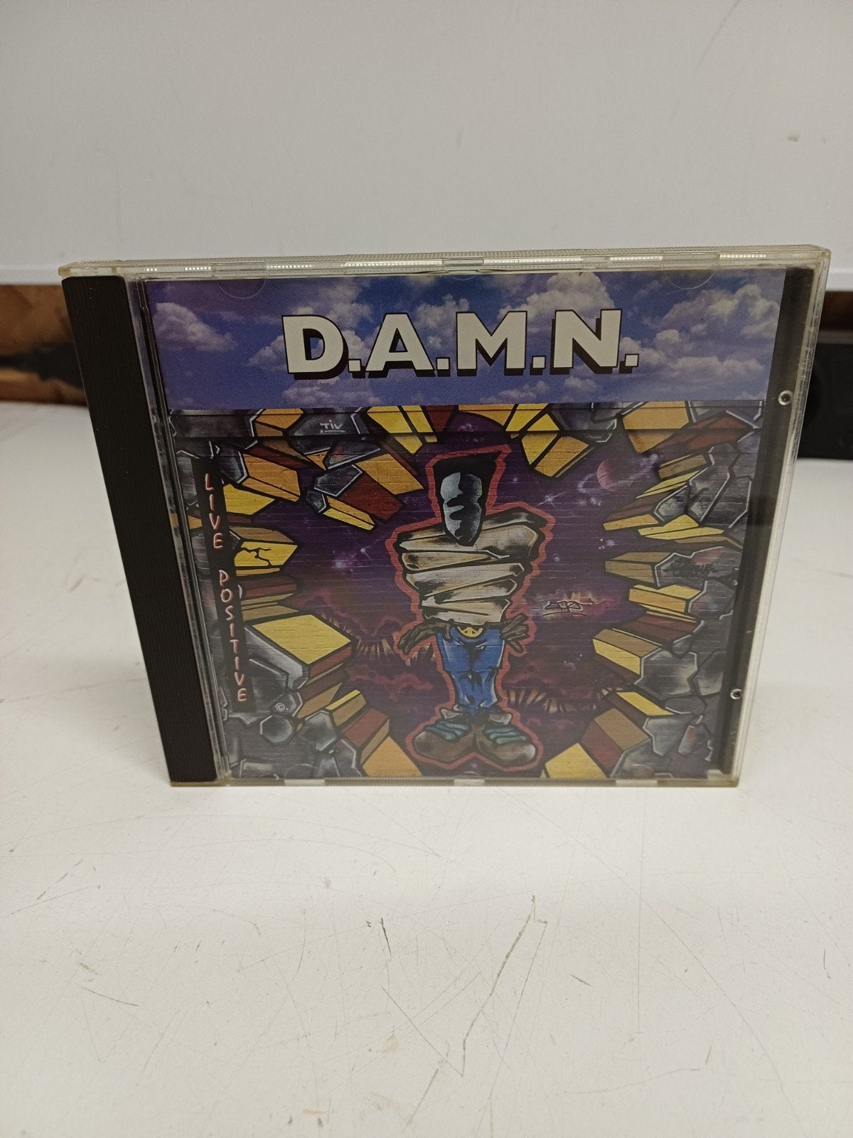 D.A.M.N. - Live Positive CD in zeer goede staat, Inclusief doosje, Ophalen of Verzenden, Zo goed als nieuw, Album