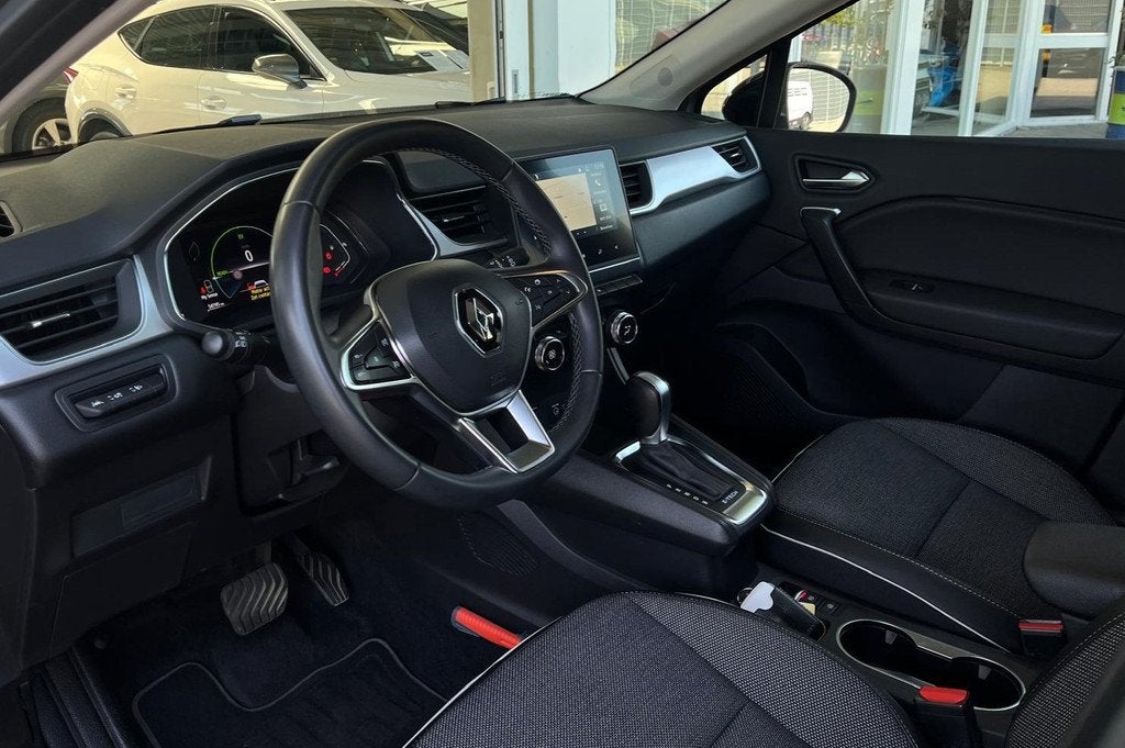 Renault Captur 1.6 E-Tech Hybrid 145 Intens | CAMERA | CRUIS, Auto's, Renault, 94 pk, Gebruikt, 715 kg, Leder en Stof