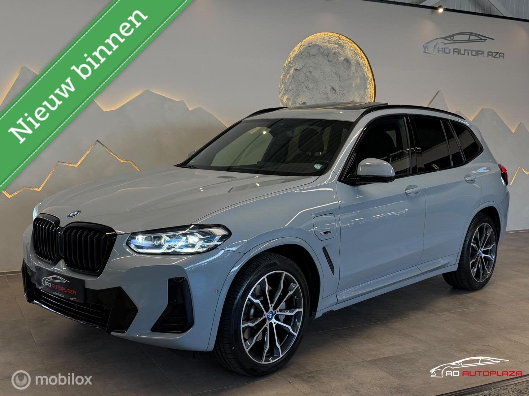 BMW X3 xDrive30e M Sport Brooklyn grey Panorama/Keyless/Trek, Automaat, 1998 cc, Zwart, Leder