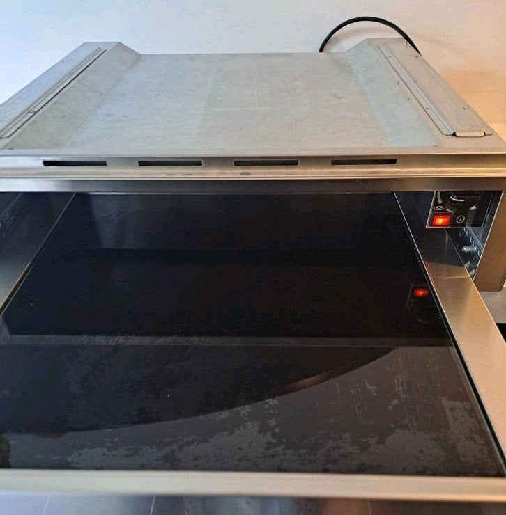 Boretti  bordenwarmer, Ophalen