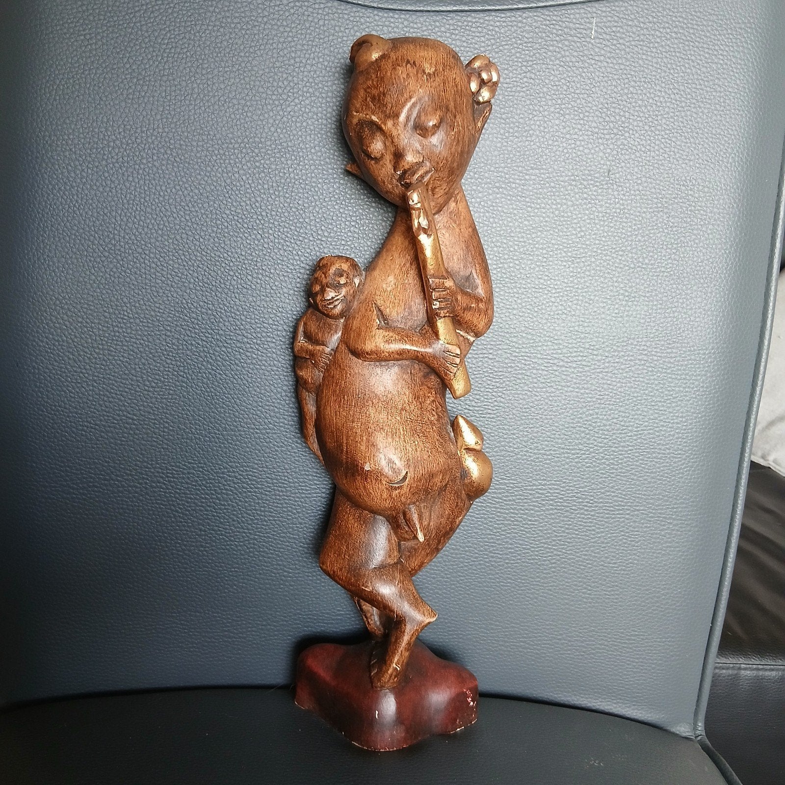 houten beeld "Fluitspelende man met kind", Ophalen of Verzenden