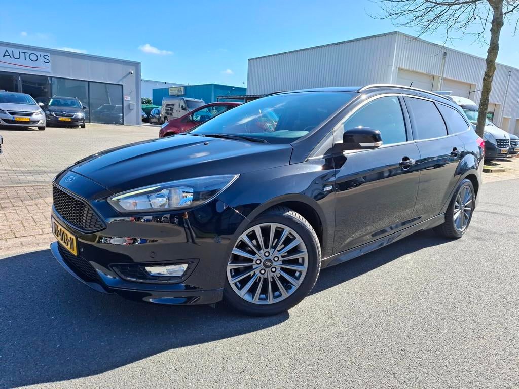 Ford Focus Wagon 1.0 ST LINE NAVI/CLIMA/CRUISE/PDC/BLACK!, Stof, Gebruikt, Zwart, Handgeschakeld