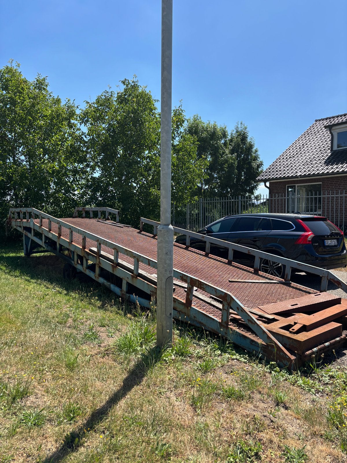 Verrijdbare hydraulische laadbrug 10T, Ophalen