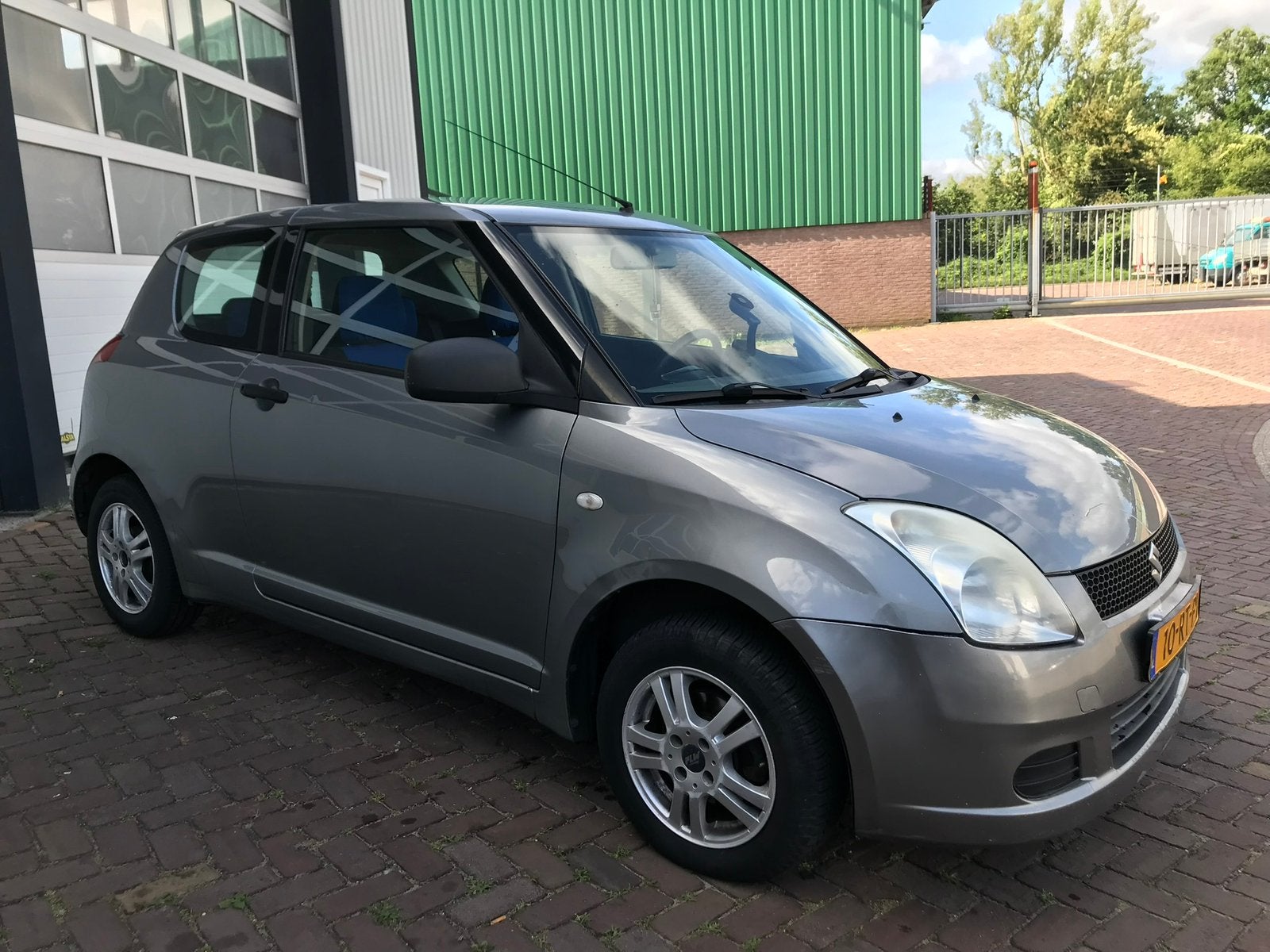 Suzuki Swift 1.3 3D 2005 Grijs, Auto's, Suzuki, Stof, Swift, Origineel Nederlands, Bedrijf