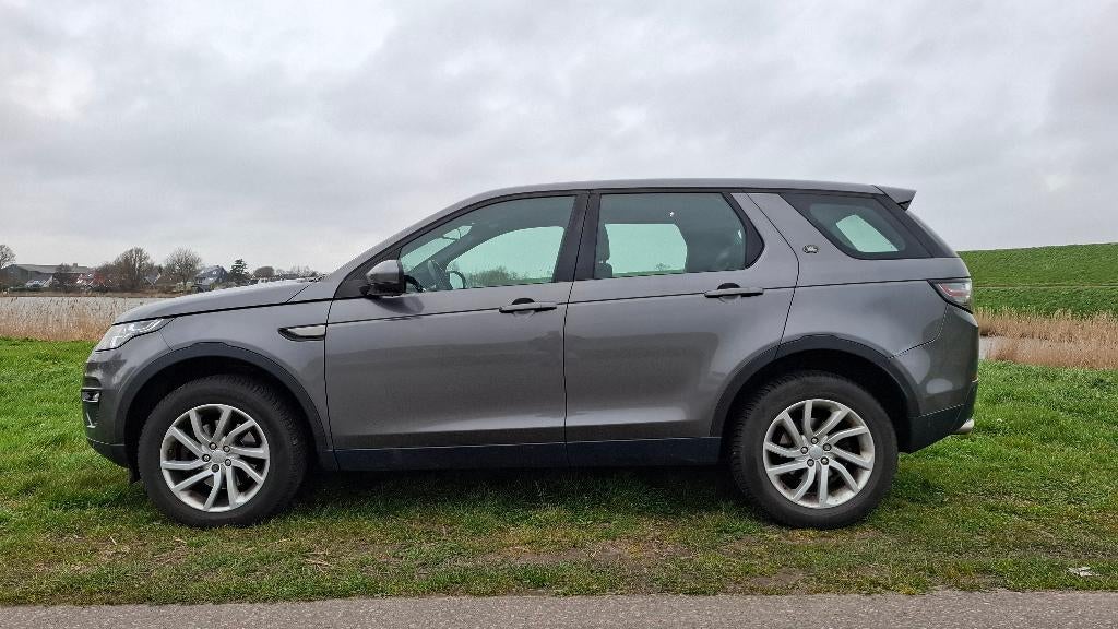 Land Rover Discovery Sport 2.0 TD4 4WD Aut9 2016 Grijs, Auto's, Land Rover, Automaat, 4 cilinders, Discovery Sport, Diesel