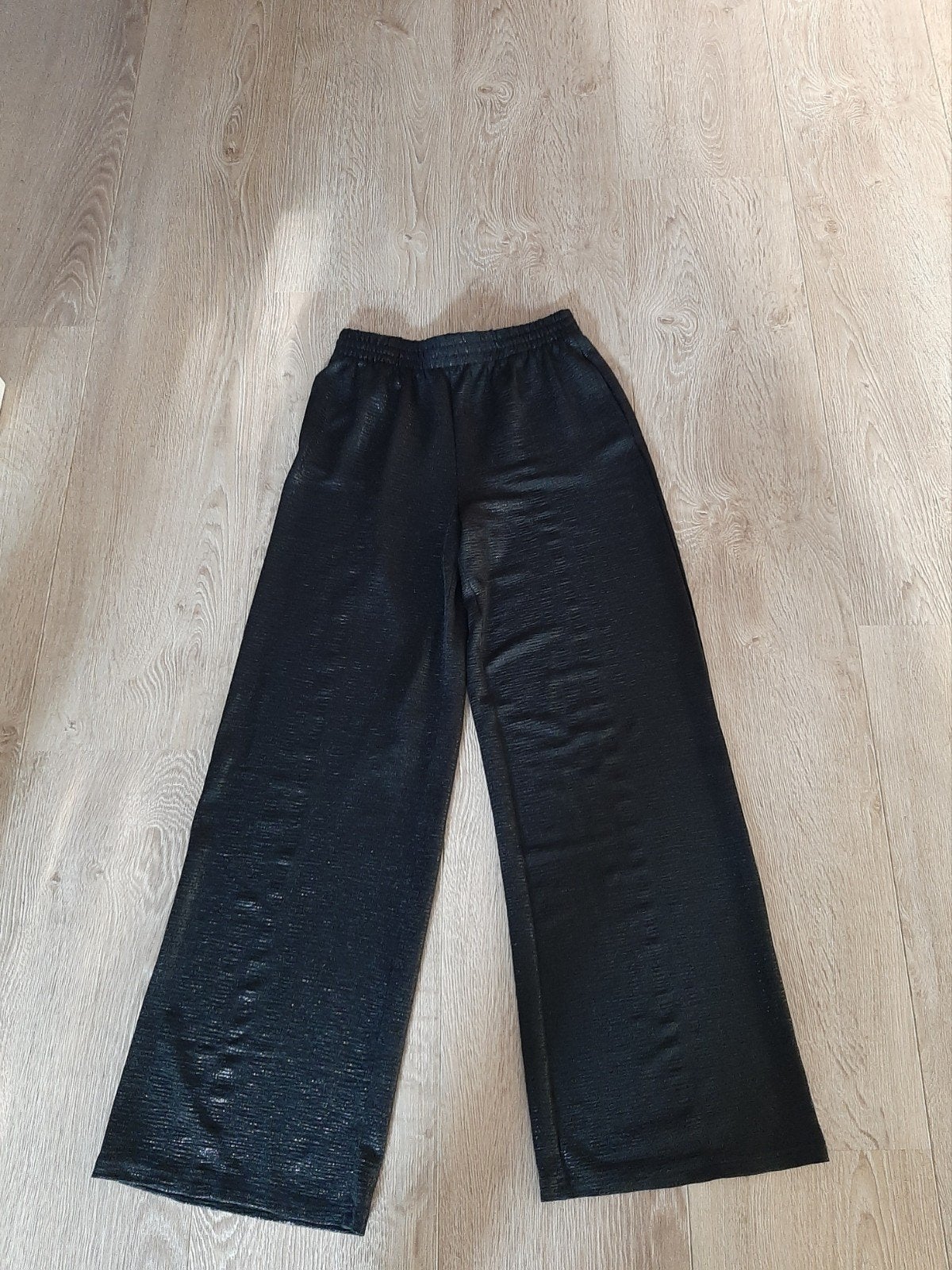 Zwart Shoeby glitter flared broek maat XS, Zwart, Ophalen of Verzenden, Zo goed als nieuw, Shoeby