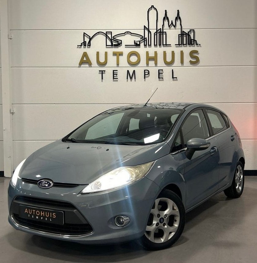 Ford Fiesta 1.25 Titanium Nap Airco Cruise Climate 5Deurs Tr, Voorwielaandrijving, Stof, 1242 cc, 82 pk