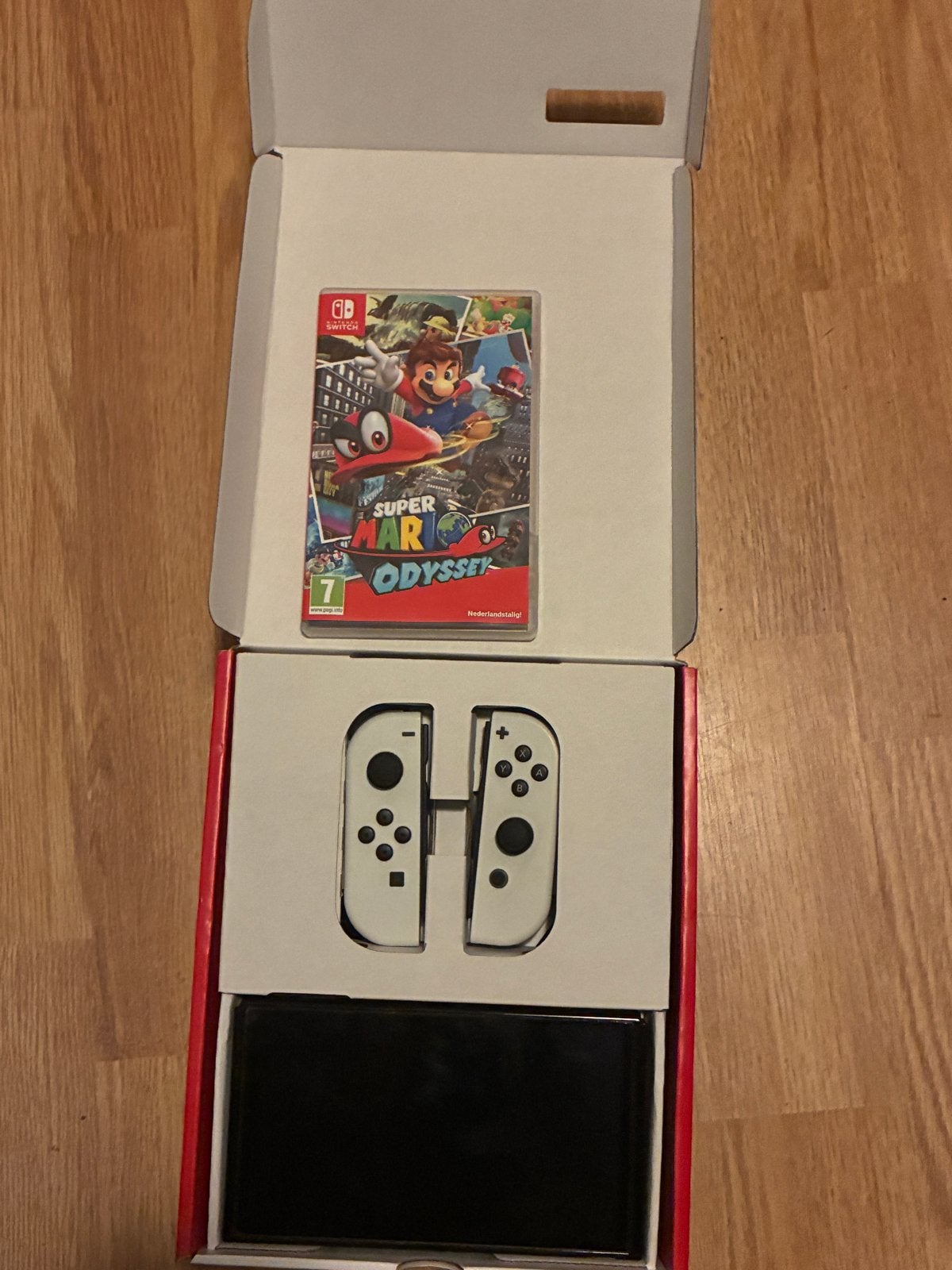 Nintendo Switch OLED + Mario Odyssey (Zo goed als nieuw), Switch OLED, Met games, Met 2 controllers, Ophalen of Verzenden