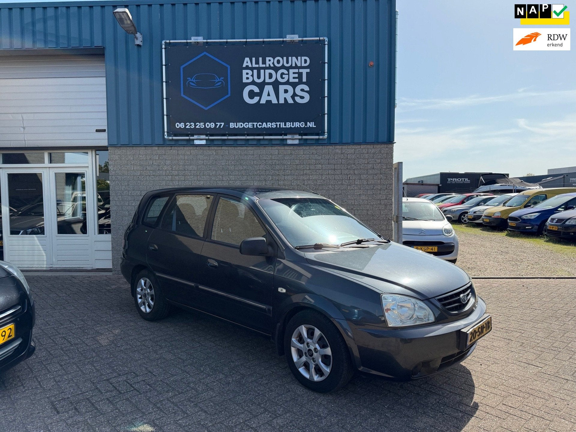 Kia Carens 2.0 CVVT M-bition, Voorwielaandrijving, Metallic lak, Stof, Zwart