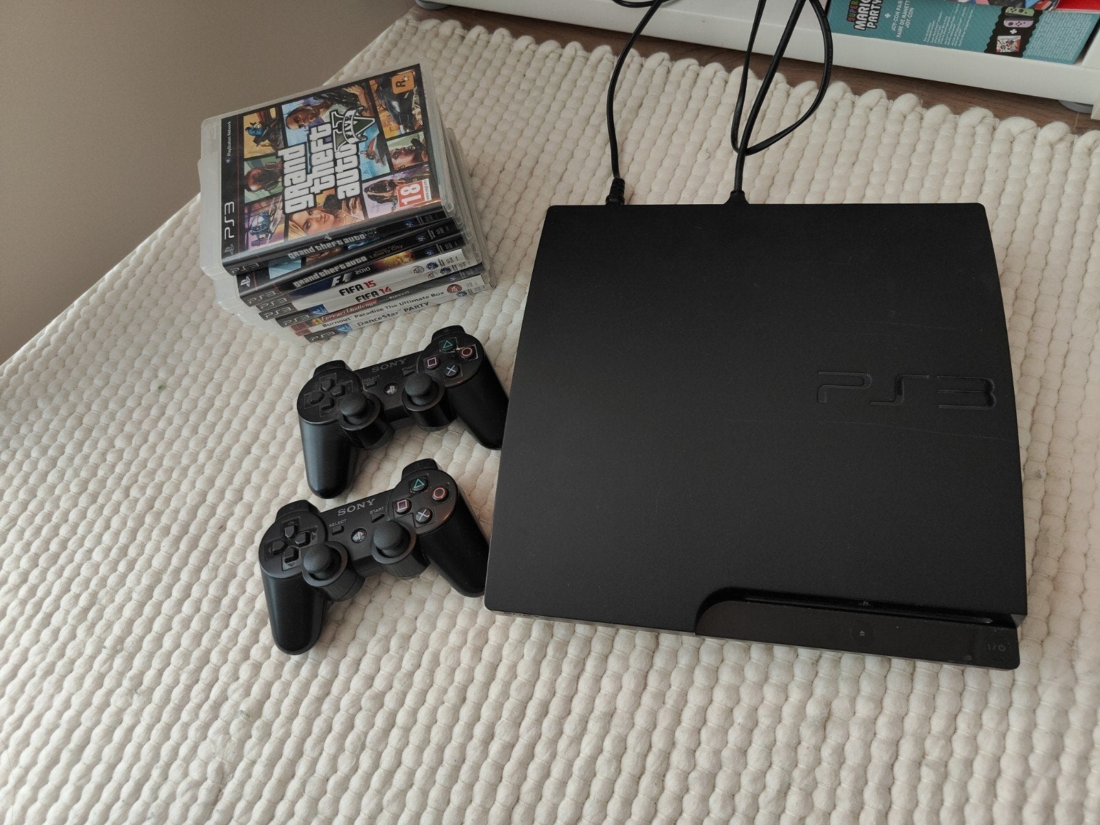 PlayStation 3 (PS3) met 2 controllers en 7 games, Spelcomputers en Games, Ophalen of Verzenden, Gebruikt, Overige genres, Vanaf 3 jaar