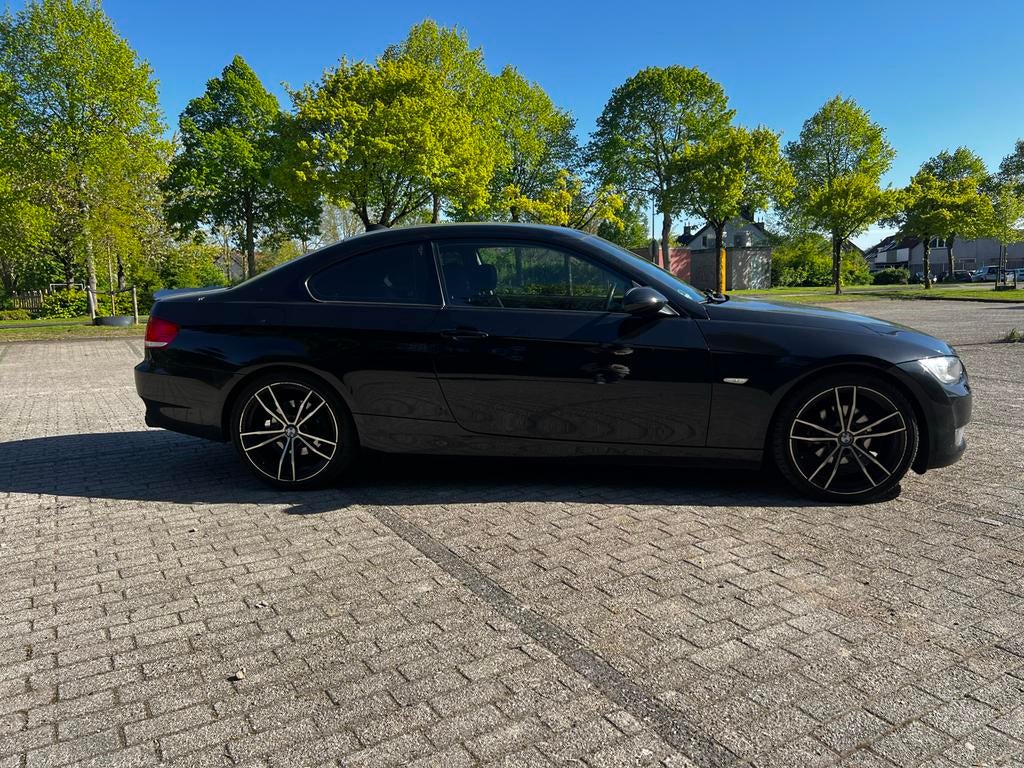 BMW 3-Serie 2.0 coupe 2009 | sportuitlaat | M-velgen, 1995 cc, Zwart, 4 cilinders, 4 stoelen