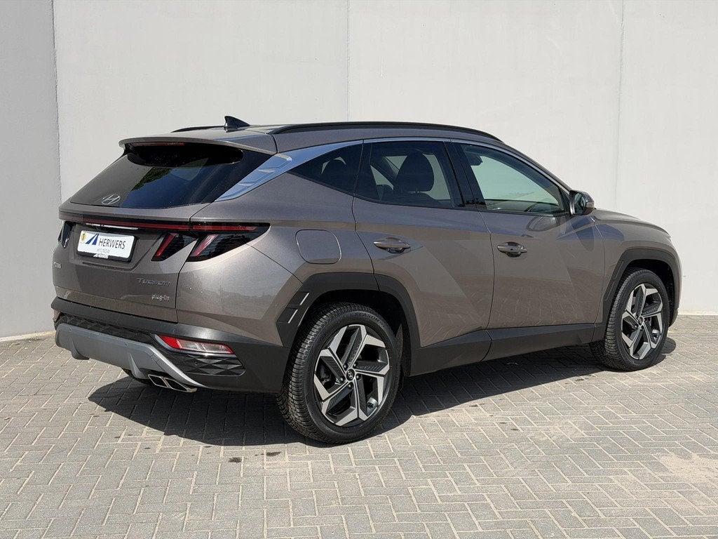 Hyundai Tucson 1.6 T-GDI PHEV Comfort Smart 4WD / Navigatie, Auto's, Hyundai, Automaat, 1350 kg, Gebruikt, Euro 6