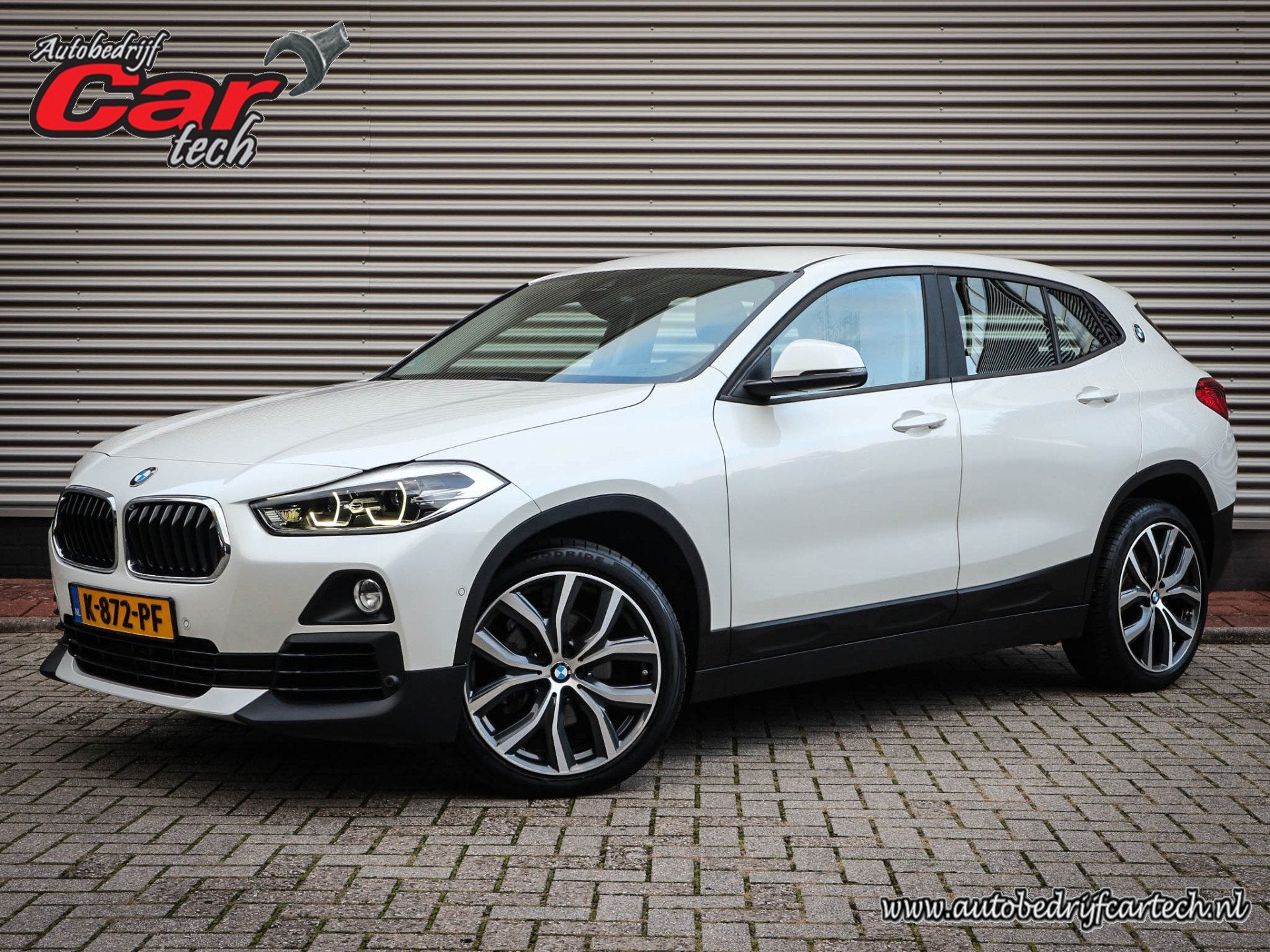 BMW X2 sDrive18i High Executive Clima | Cruise | Navi | Led, Auto's, Gebruikt, Euro 6, Wit, Grijs