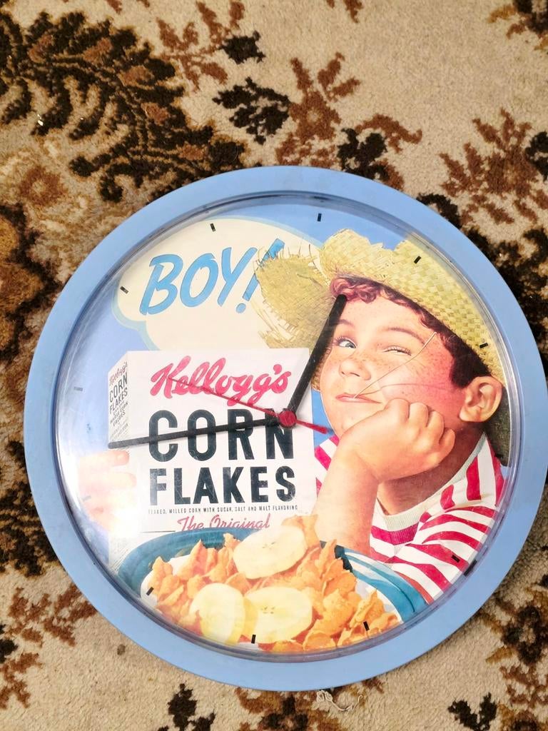 9863 : Vintage Kellogg's Cornflakes Clock "Boy", Huis en Inrichting, Ophalen of Verzenden, Gebruikt, Analoog, Wandklok