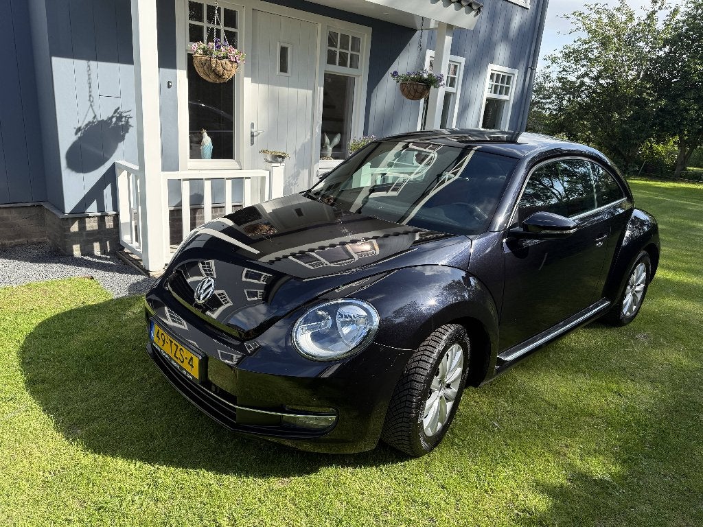 Volkswagen Beetle (Kever) 1.2 TSI 77KW BMT 2012 Zwart, Voorwielaandrijving, Euro 5, Stof, Beetle (Kever)