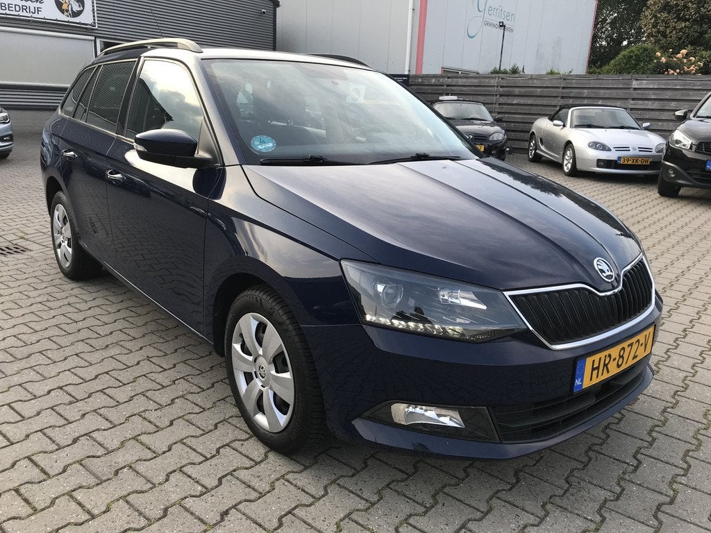 Skoda Fabia Combi 1.0 Ambition (bj 2015), Stof, Euro 6, Blauw, 979 kg
