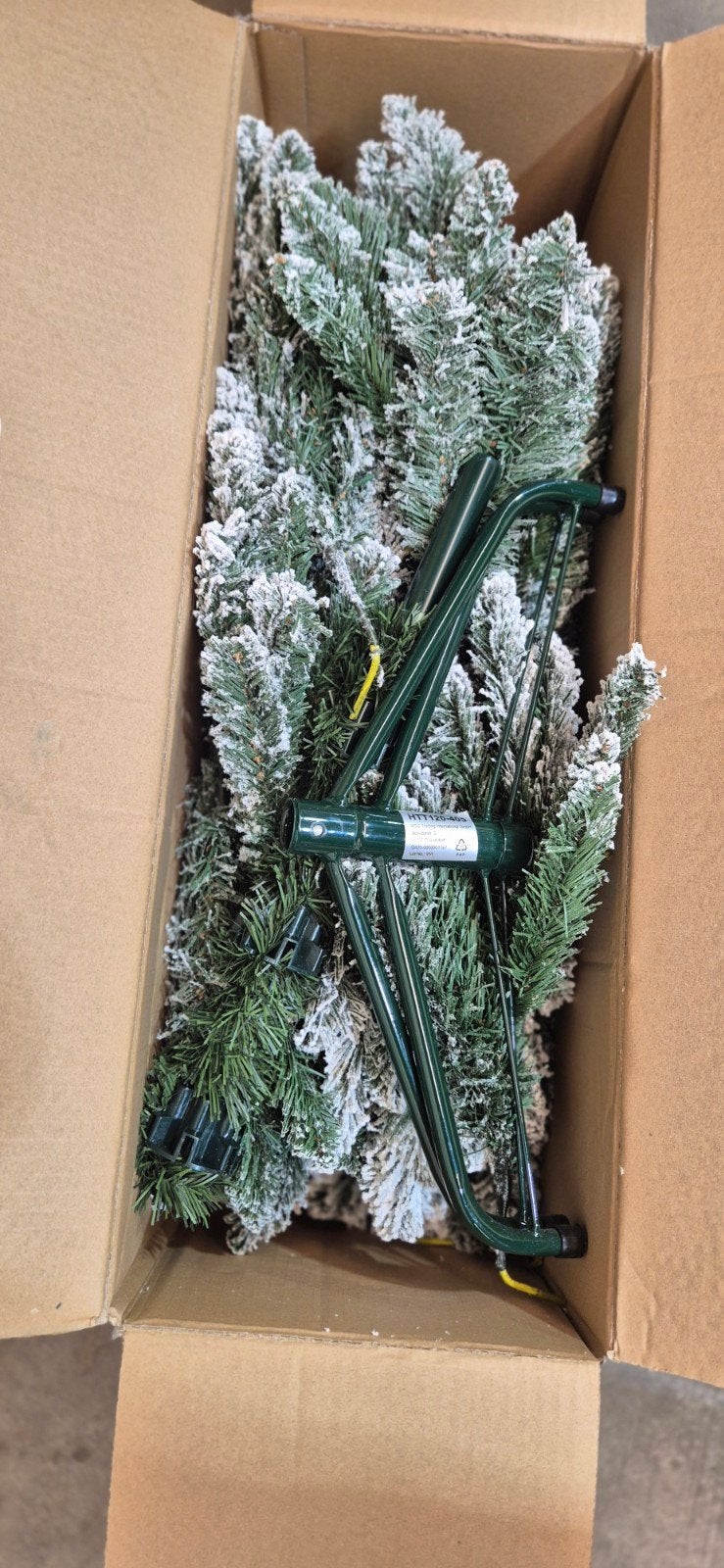 Mooie kunstkerstboom, Ophalen