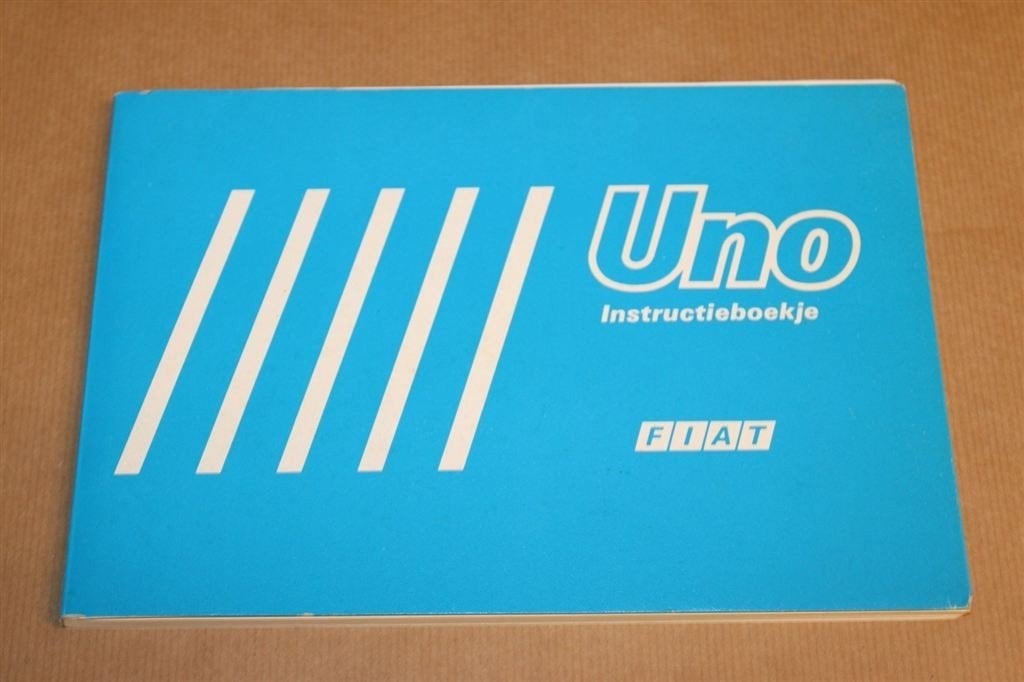 Fiat Uno Instructieboekje + toebehoren - 1987, Auto diversen, Ophalen of Verzenden