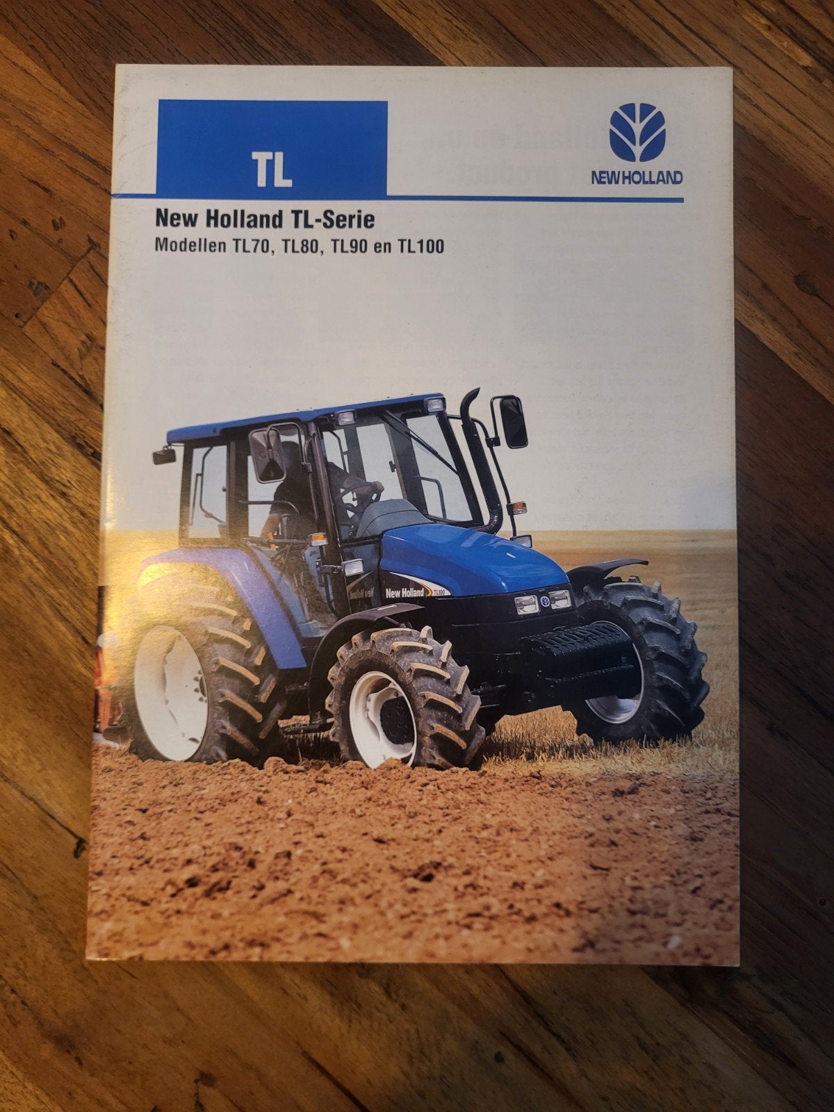 tractor folder New Holland TL- serie, Boeken, Ophalen of Verzenden, Zo goed als nieuw