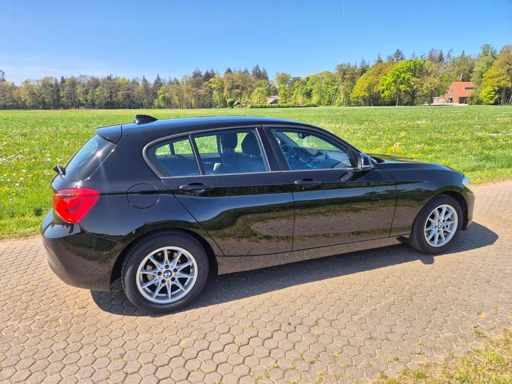 BMW 1-Serie 116i met nieuwe APK, 1-Serie, Achterwielaandrijving, 1280 kg, Zwart