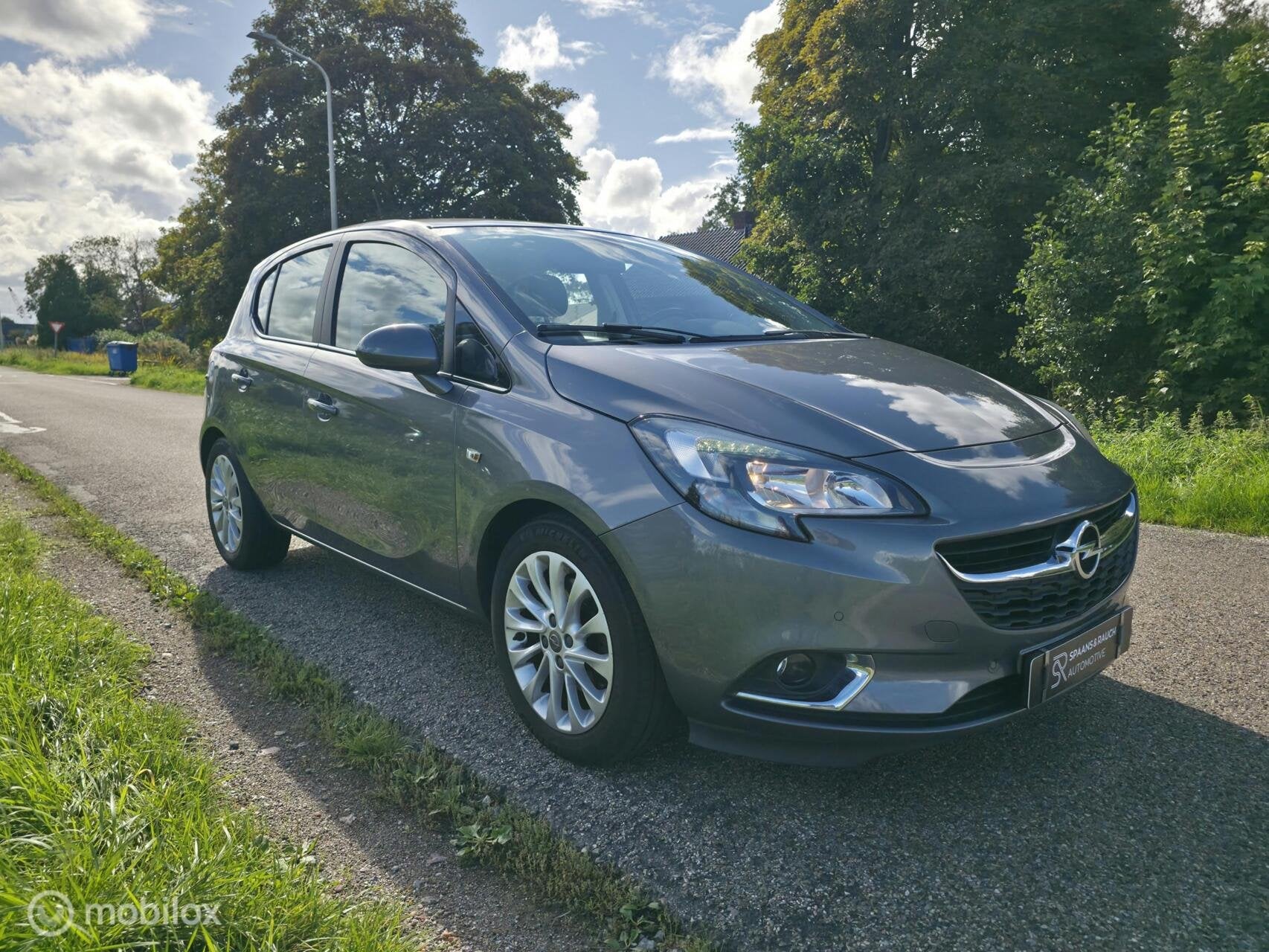 Opel Corsa 1.0 Turbo Business+ / Half leder / Cruise control, Auto's, Voorwielaandrijving, Gebruikt, Leder en Stof, 49 €/maand