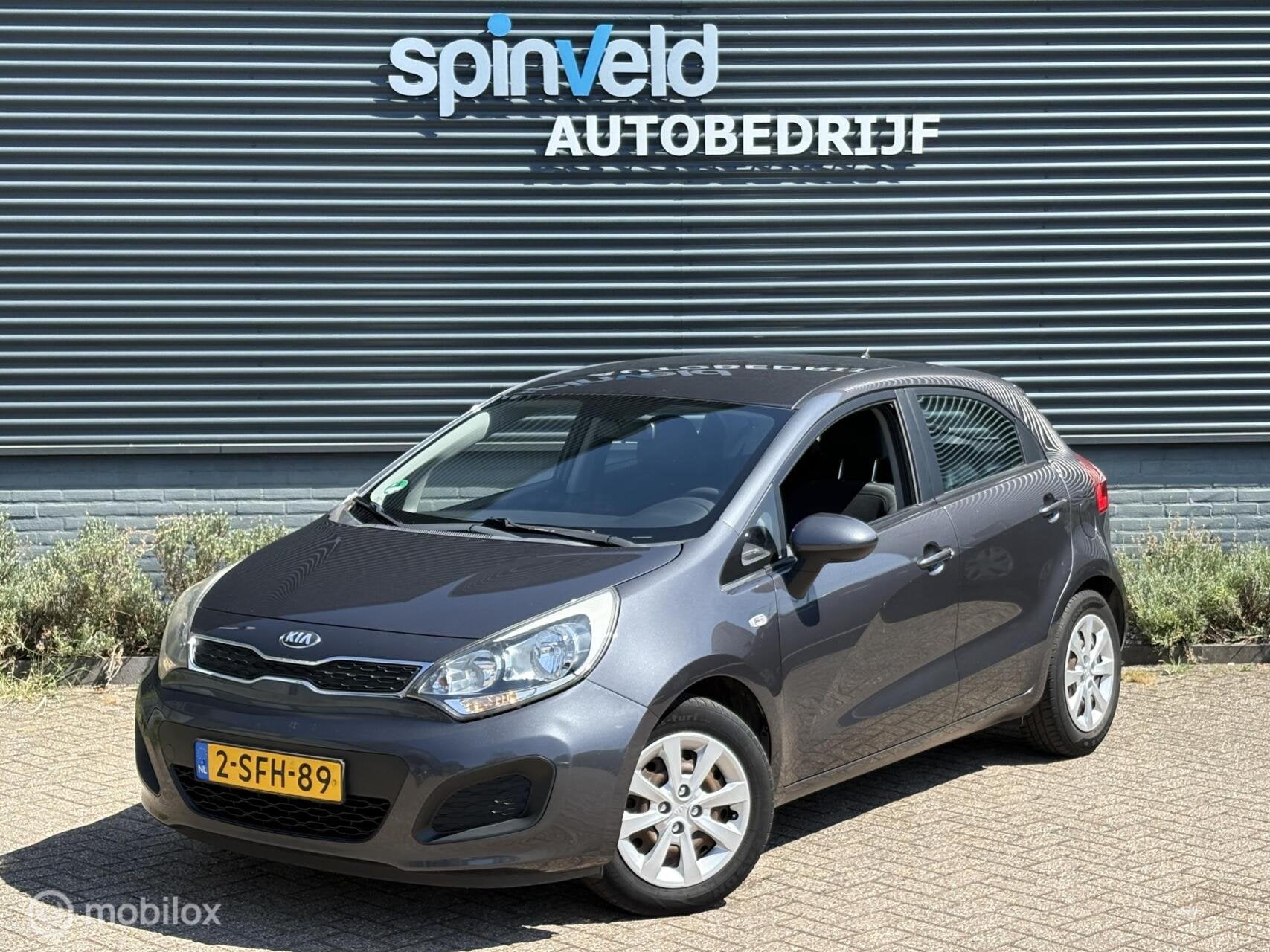 Kia Rio 1.2 CVVT Comfort Pack - Navi - Airco - Nap -, Auto's, Euro 5, Parkeersensor, 4 cilinders, Origineel Nederlands