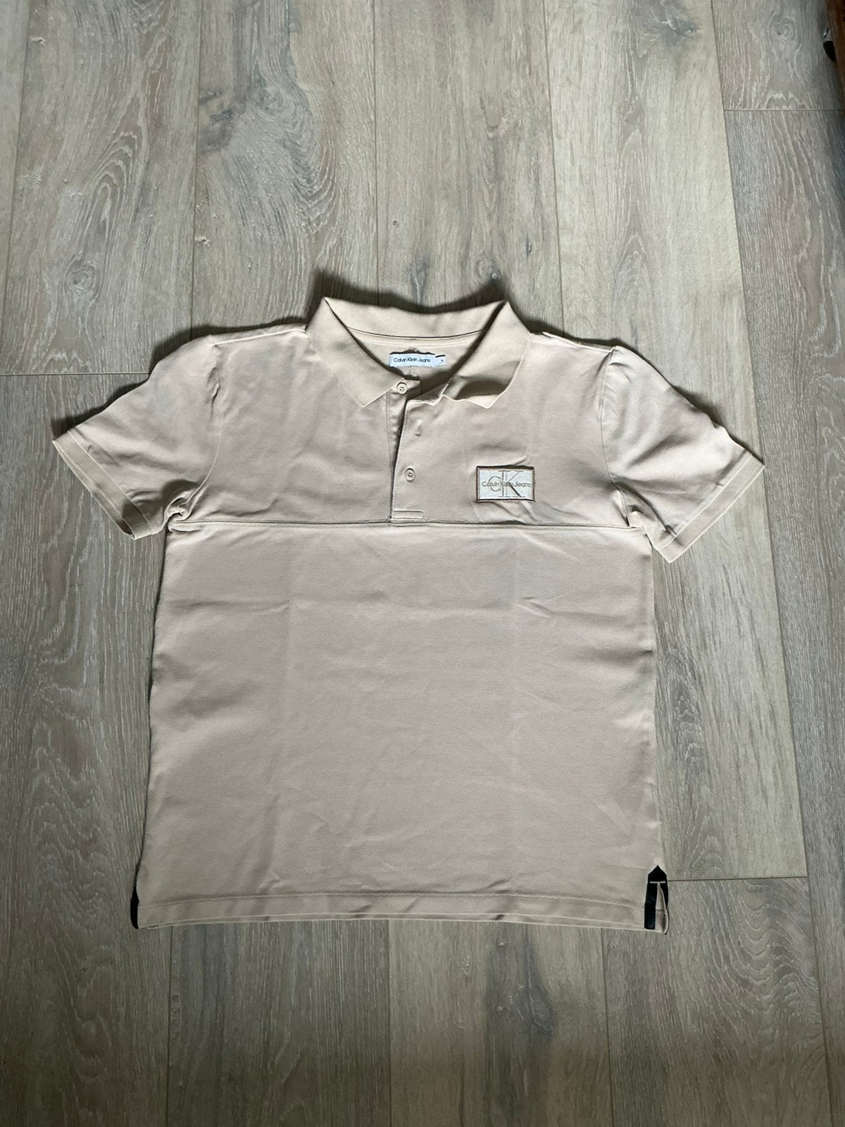 Beige Calvin Klein Jeans polo maat 16 (valt klein), Ophalen of Verzenden, Jongen, Shirt of Longsleeve