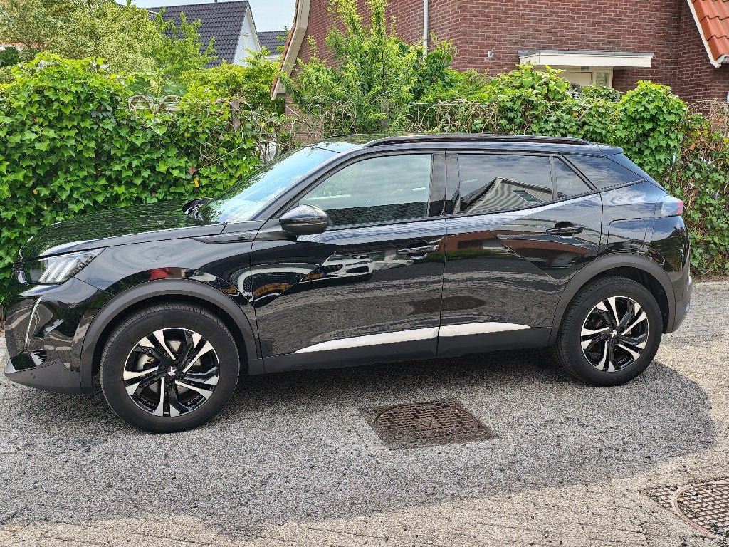 Peugeot 2008 EV GT 50kWh 136pk 2020 Zwart - als nieuw!, Zwart, Leder en Stof, Zwart, Lichtsensor