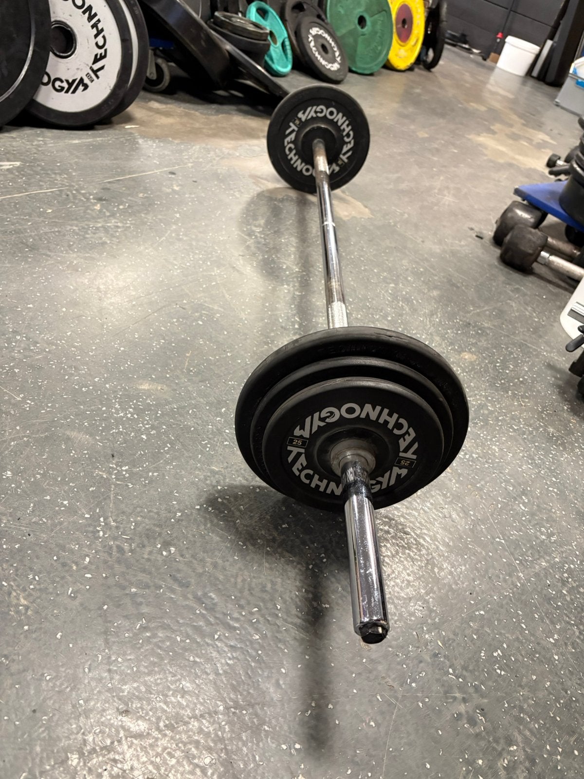 25 kg technogym vaste halter stang gewichten, Ophalen of Verzenden, 25 kg, Halter stang, Halterset