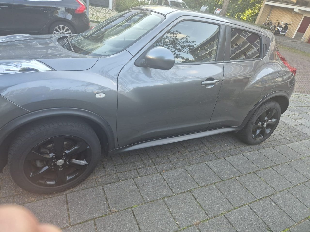 Nissan Juke 1.6 2010 Grijs, Auto's, Euro 5, Stof, 1250 kg, Zwart