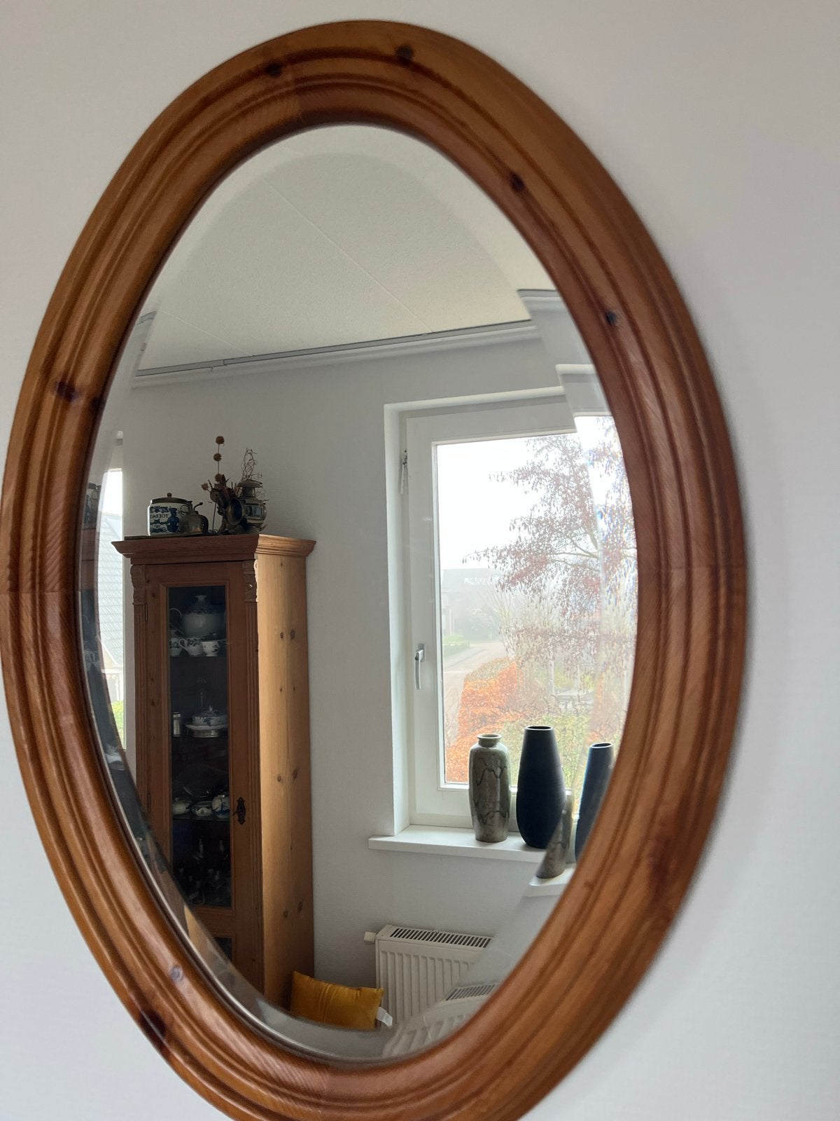 Ovale spiegel met houten lijst, Ophalen
