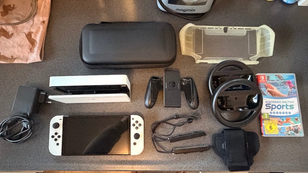 Nintendo Switch OLED + Sports en accessoires | Als nieuw, Met games, N.V.T., Met 2 controllers, Ophalen of Verzenden