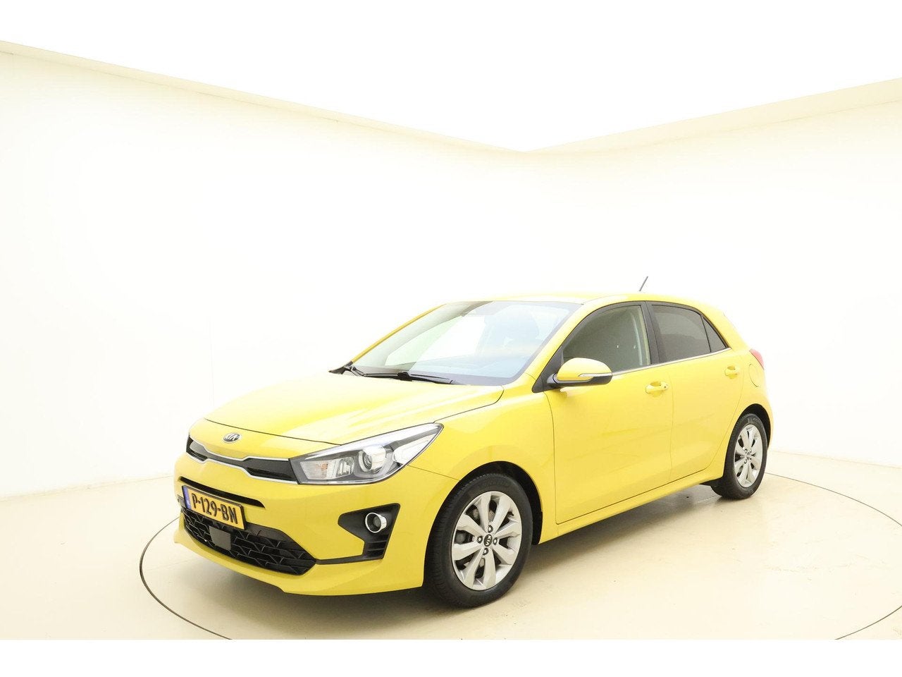 Kia Rio 1.0 T-GDi 100 PK | Automaat | Trekhaak | Stoelverwar, Auto's, Gebruikt, 49 €/maand, Geel, Bedrijf