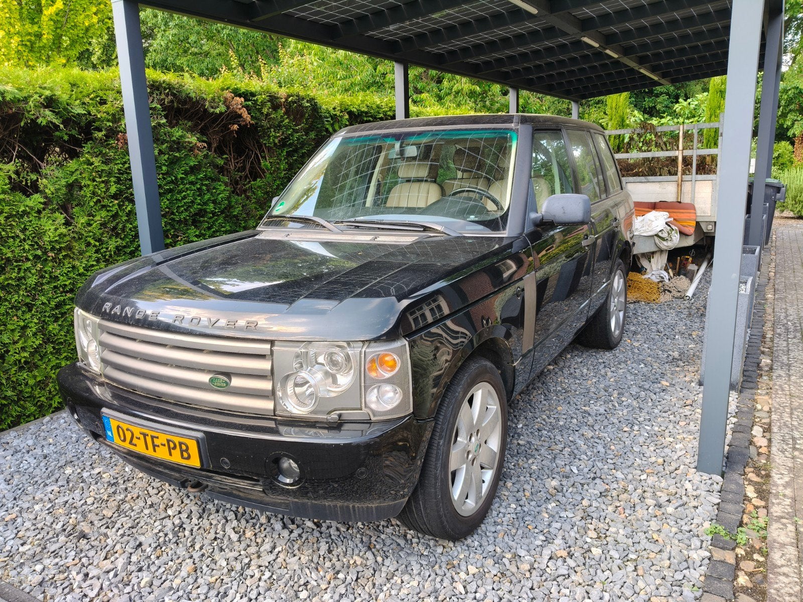 Land Rover Range Rover 4.4 V8 AUT 2004 Zwart, Auto's, Automaat, 2460 kg, Zwart, Vierwielaandrijving