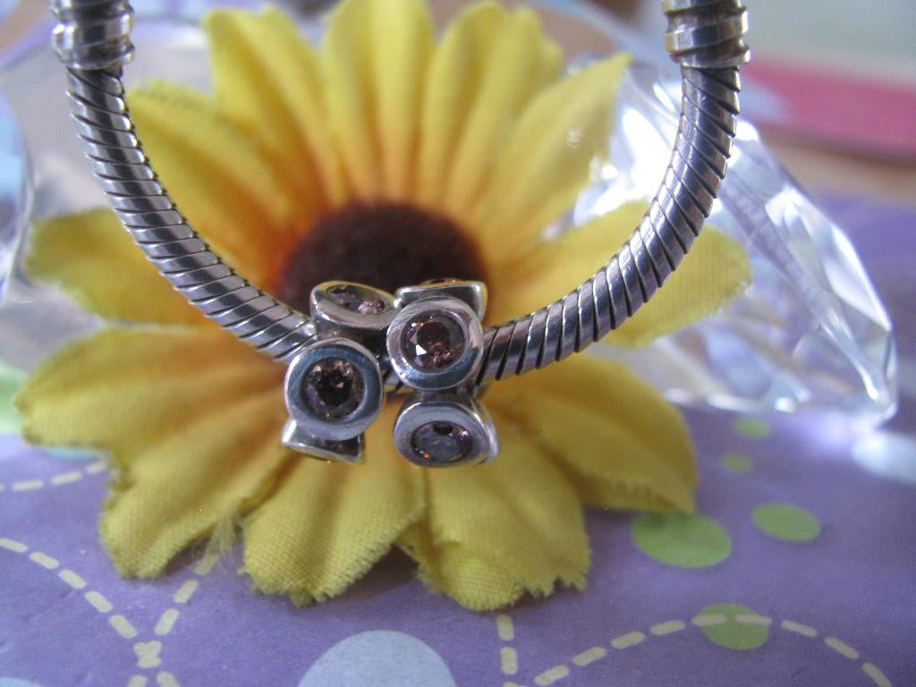 2 x Pandora spacer P336 = lights + zirks BRUIN in 1 koop =, Pandora, Ophalen of Verzenden, Zo goed als nieuw, 2 of 3 bedels
