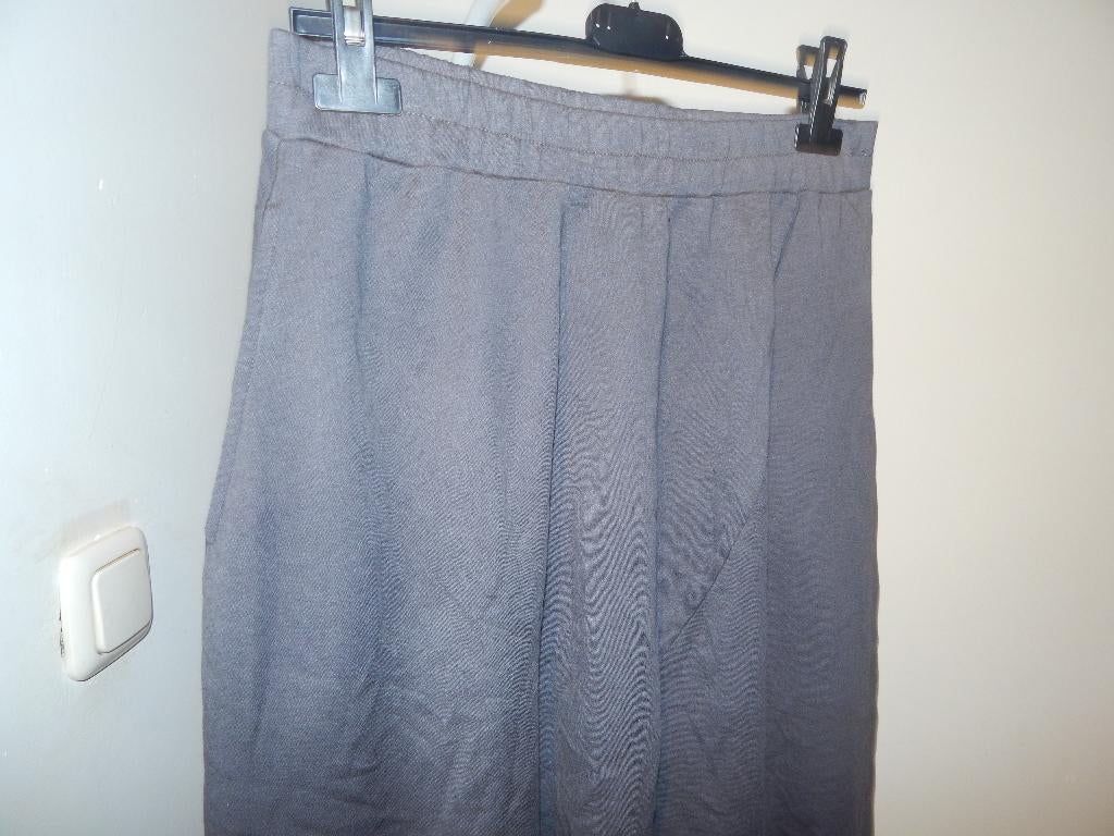 Oska bol vallende rok grijs van kleur insteek zakken 1 M, Kleding | Dames, Maat 38/40 (M), Verzenden, Zo goed als nieuw, Grijs