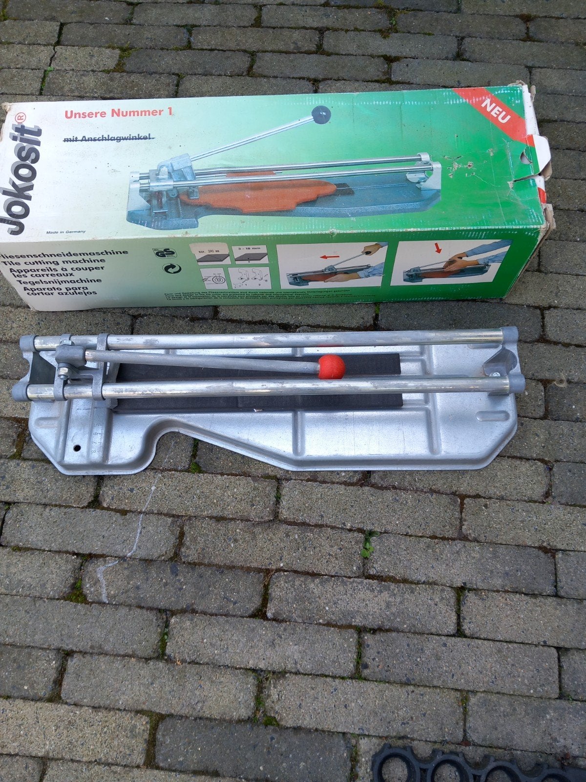 Tegelsnijder te koop, Ophalen