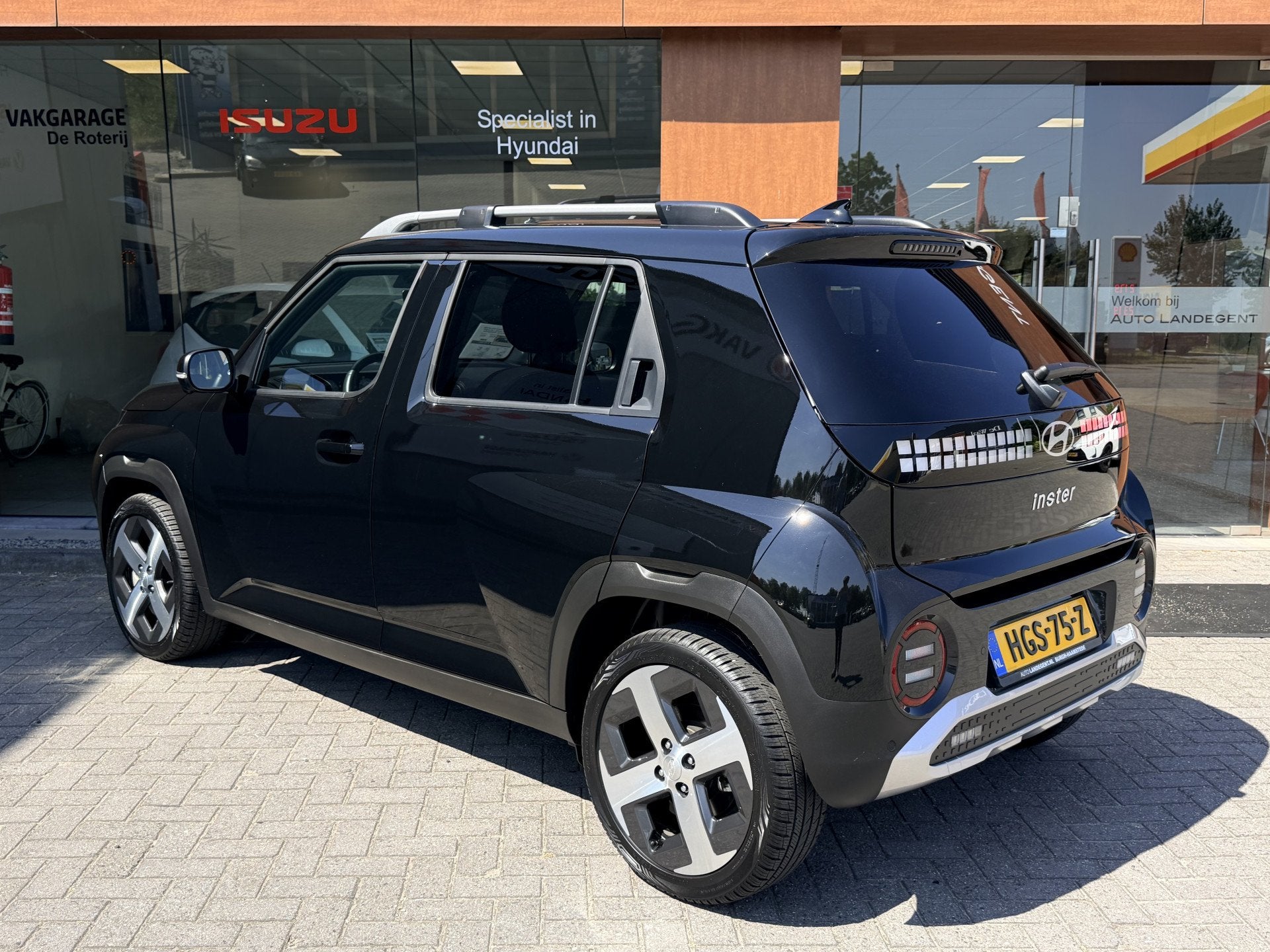 Hyundai Inster Evolve Plus 49 kWh +Winterpack | Apple/Androi, Auto's, Stof, Gebruikt, 116 pk, Zwart