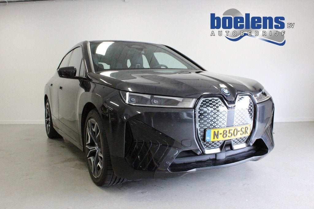BMW iX xDrive40 High Executive 77 kWh | NL-AUTO! | PANO | ST, Auto's, BMW, Automaat, Gebruikt, Zwart, Vierwielaandrijving