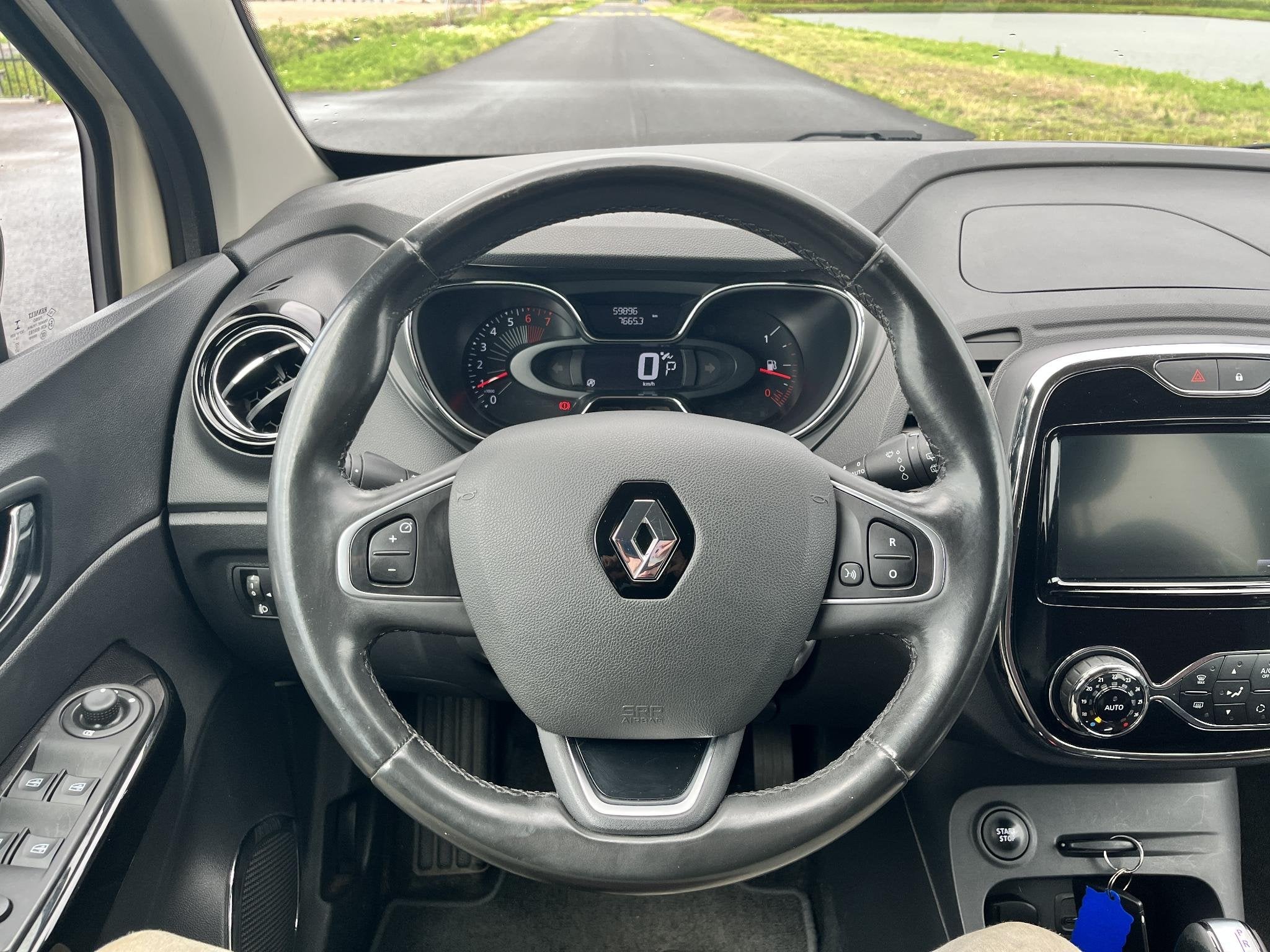 Foto 26 van Renault Captur 1.2 TCe Xmod Clima, cruise, stoelverwarming,