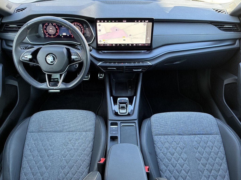 Skoda Octavia Combi 1.5 TSI MHEV Sportline / Fabrieksgaranti, Auto's, Skoda, Euro 6, 4 cilinders, Leder en Stof, Automatische klimaatregeling