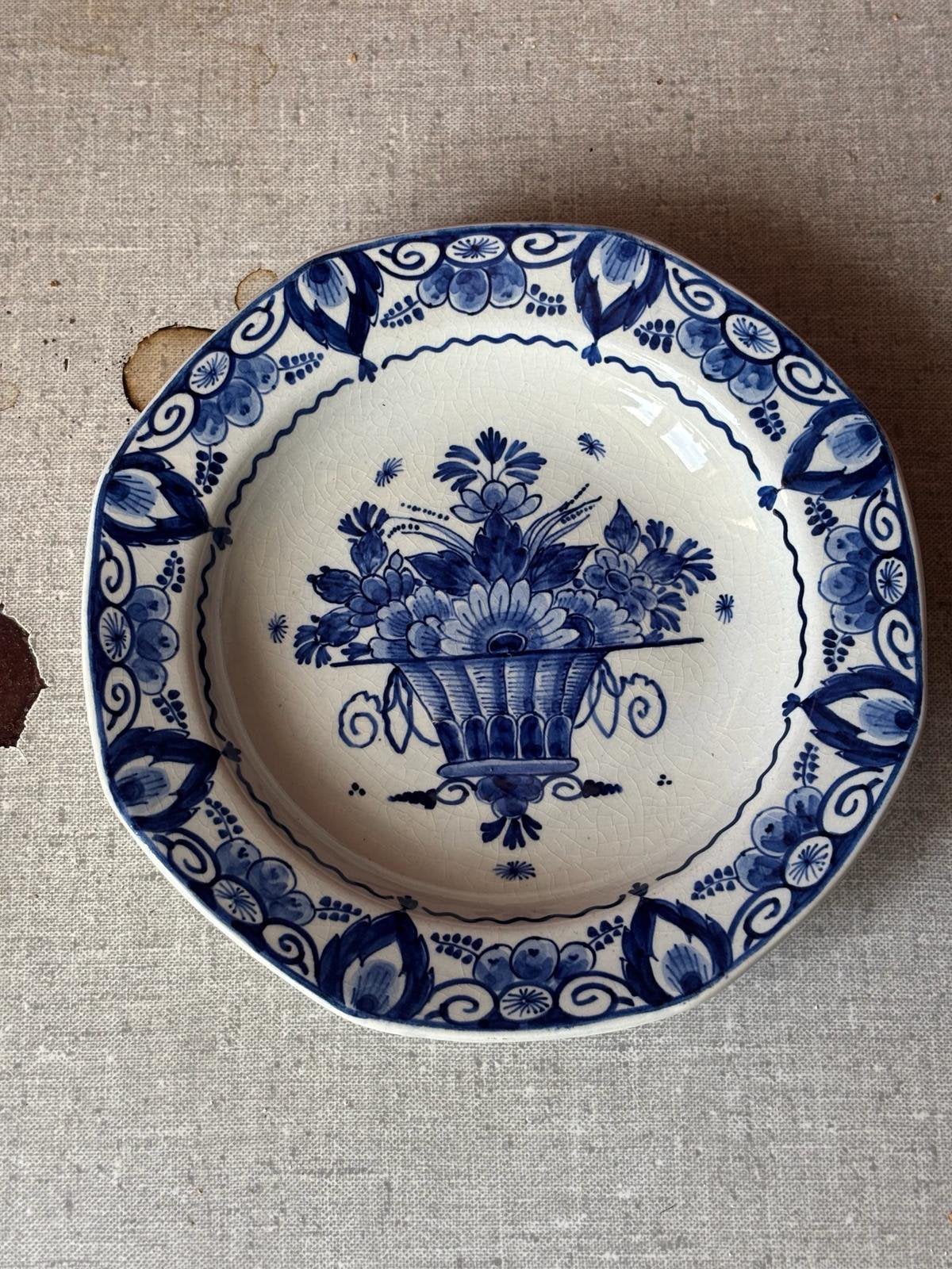 Delfblauwe bordjes, Ophalen
