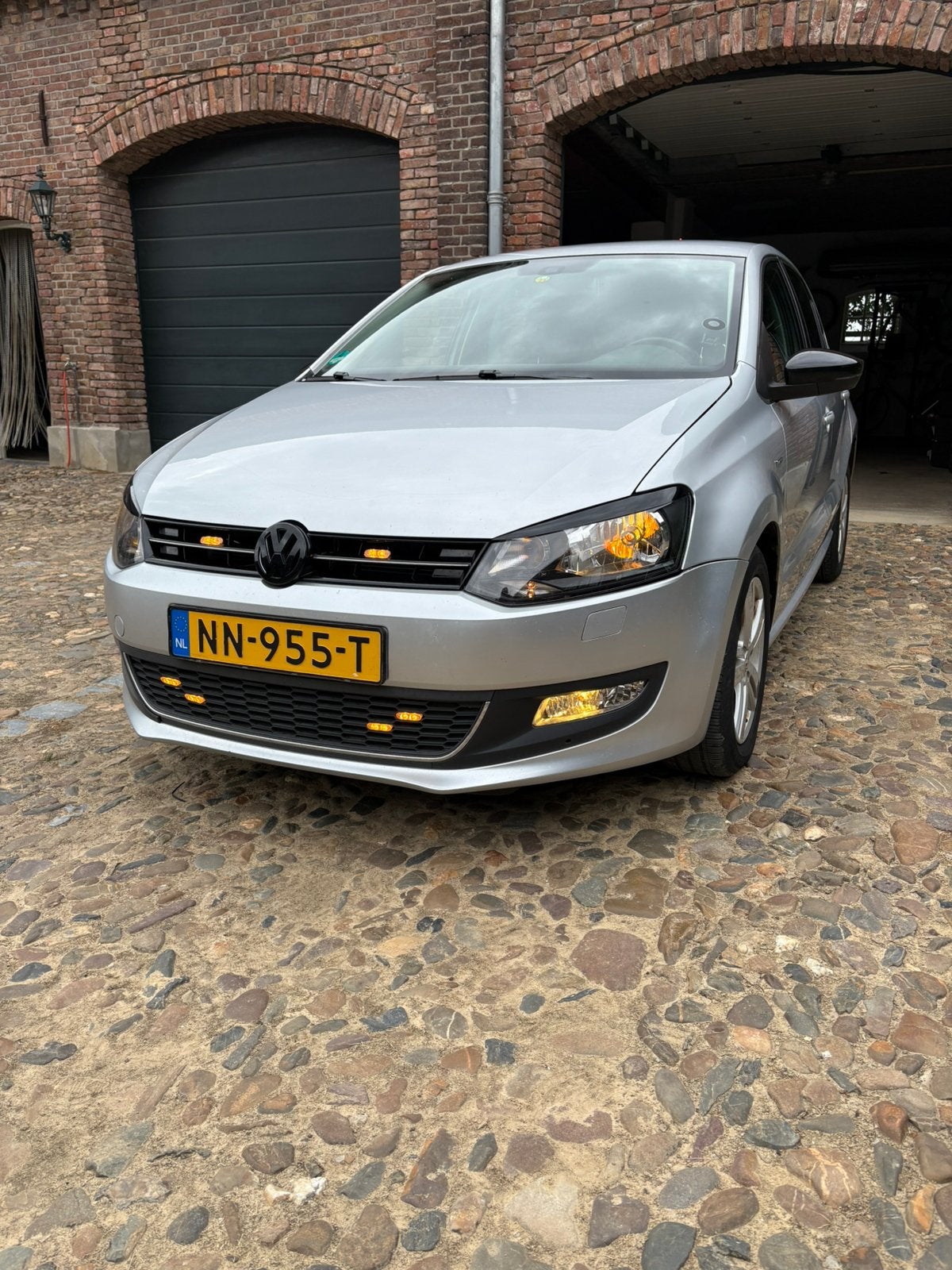 Volkswagen Polo Match 1.2 TSI 66KW 2012 Grijs, Auto's, Volkswagen, 40 €/maand, 4 cilinders, Leder en Stof, Handgeschakeld