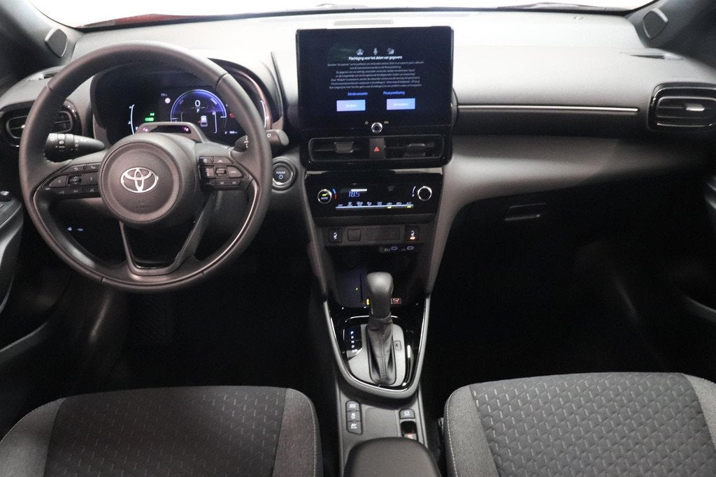 Toyota Yaris Cross 1.5 Hybrid 130 Dynamic | Nieuw! | Dodehoe, Auto's, Toyota, Stof, Met garantie (alle), 23 km/l, 1490 cc
